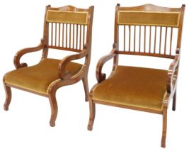 A pair of Edwardian mahogany and marquetry low chairs or nursing chairs, each with a padded back and