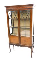 An Edwardian marquetry display cabinet, with two glazed doors and cabriole legs, 94cm wide.
