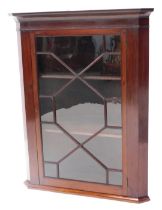 A 19thC mahogany corner cabinet, with a single astragal glazed door, 80cm wide.