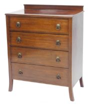 An early to mid 20thC mahogany chest of drawers, with a raised back above four drawers, each with dr