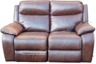 An electric reclining two seat brown leather sofa, with transformer.