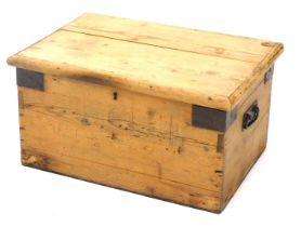 A stripped pine and metal box, 37cm wide.