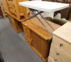 A substantial pine office desk, with two twin pedestals, to include two drawer sections and two cupb