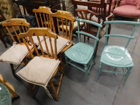 Six dining chairs, comprising a set of four pine kitchen chairs, and two turquoise painted stick bac