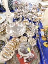 Various silver plated wares, comprising rose bowl, toast rack, candelabrums, milk jug, etc. (2 trays