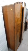 A 1920s/30s burr walnut veneer double wardrobe.