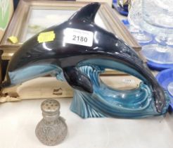 Poole pottery dolphin, and a steel pepperette. (2)