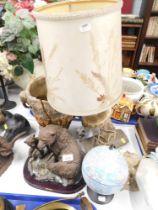 A horn table lamp, vase, bear figure group, miniature globe, and cheetah figure group. WARNING!