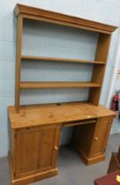 A pine twin pedestal desk and a bookcase with two shelves. (2)