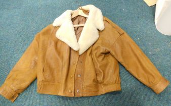 A lady's suede and faux sheepskin coat.