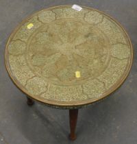 A Benares topped brass top table.