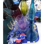 Decorative glassware, comprising blue glass decanter and stopper, glass fish, vase, bottles, paperwe