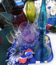 Decorative glassware, comprising blue glass decanter and stopper, glass fish, vase, bottles, paperwe