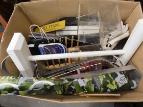 A group of assorted perfume display posters, stands and accessories. (1 box)