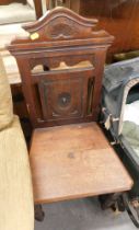 A 19thC mahogany hall chair, with a carved and pierced back rail of fan design.