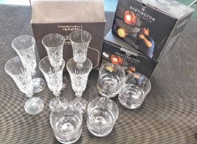 A group of Dartington crystal glasses, boxed.