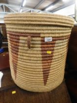 A rush woven linen basket.