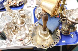 A silver plated serving tray, three piece tea service, napkin rings, sugar shaker, a brass bell, bra