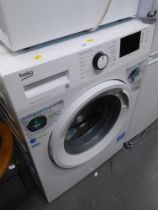 A Beko 8kg washing machine.