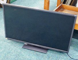 A Mitchell and Brown 32" flat screen television, with in built DVD player. (no remote)