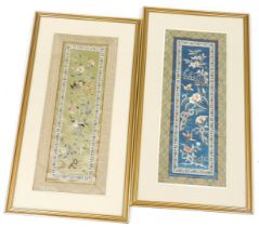 Two framed Chinese silk sleeve bands, one embroidered with butterflies and flowers in a fenced garde