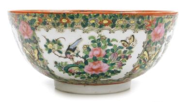 A late 19thC Cantonese famille rose porcelain bowl, decorated externally and internally with reserve