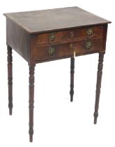 A George IV mahogany and crossbanded side table, with two frieze drawers, raised on ring turned legs