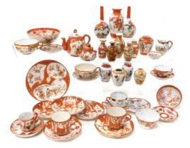 A group of Japanese Kutani pottery and porcelain, including vases, cream jugs, bowls and plates, tea