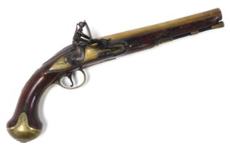 A late 18thC flintlock pistol by Grice of London, with a walnut stock and brass barrel, trigger guar