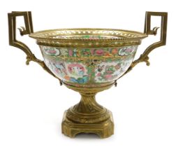 A 19thC Cantonese famille rose porcelain and ormolu mounted bowl, with a beaded and pierced mount an