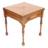 A Victorian mahogany envelope card table, with a red baize interior, raised on turned legs, on block