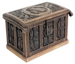 A 18thC carved oak bible box, the lid carved with a central roundel depicting a bust profile of a me