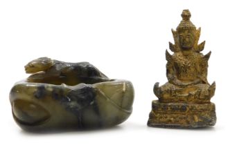 A Chinese soapstone brush washer, carved with an animal, 8cm wide, together with a gilt metal figure