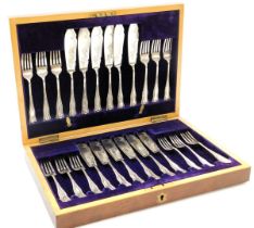 A silver plated fish canteen of cutlery, mahogany cased.