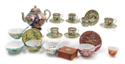 A group of Oriental ceramics, including a 19thC Japanese Imari teapot, Chinese rice bowls and spoons