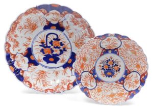 A Meiji period Japanese porcelain Imari charger, decorated centrally with a basket of flowers, withi