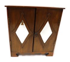 A Victorian beech apprentice chest, with two mirrored doors opening to reveal two short over three l