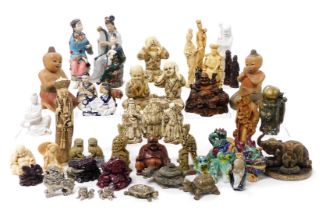 A group of Chinese porcelain pottery and resin figures, including blanc-de-chine figures of immortal