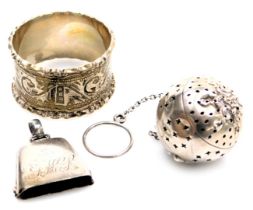An Edward VII silver and enamel baby's rattle, titled "Baby" and foliate engraved verso, monogram en