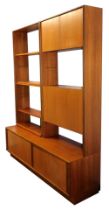 A G-Plan teak modular lounge unit, with a five shelf bookcase, and a two door cupboard, drop down dr