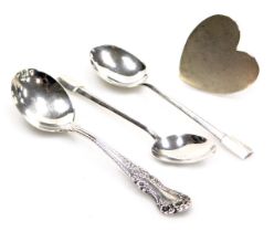 An American silver teaspoon, Edward VII silver heart shaped place card holder, Chester 1908, and a p