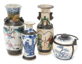 A Chinese blue and white opium pot, with metal mounts, apertures and swing handle, decorated with a