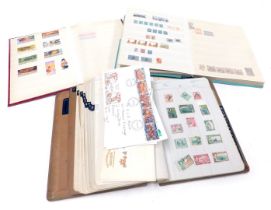 Philately. GB, Commonwealth and World stamps, in three albums, together with first day covers, etc.