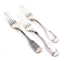 A pair of Victorian silver table forks, crest engraved, Lister & Sons, Newcastle 1863, and a further