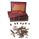 A Victorian rosewood and mother of pearl inlaid workbox, containing a toy train, cannons, Victorian