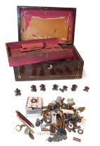 A Victorian rosewood and mother of pearl inlaid workbox, containing a toy train, cannons, Victorian