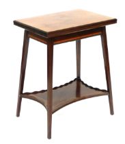 An Edwardian mahogany and satinwood crossbanded fold over card table, raised on slender square legs