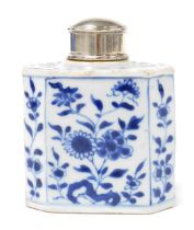 A Kangx porcelain blue and white tea caddy, with white metal lid, of canted rectangular form, decora