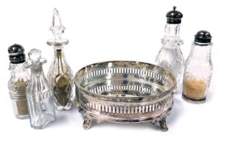 A 19thC silver plated cruet stand, containing two cut glass bottles and stoppers, and three Georgian