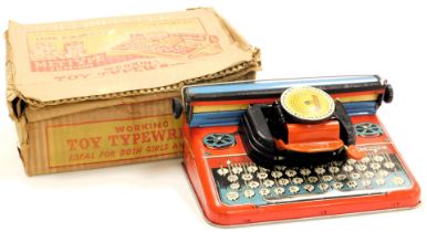 A Mettype Junior tin plate toy typewriter, boxed.